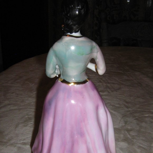 Lady In A Pink Dress Carrying Flowers - Picture 3 of 3